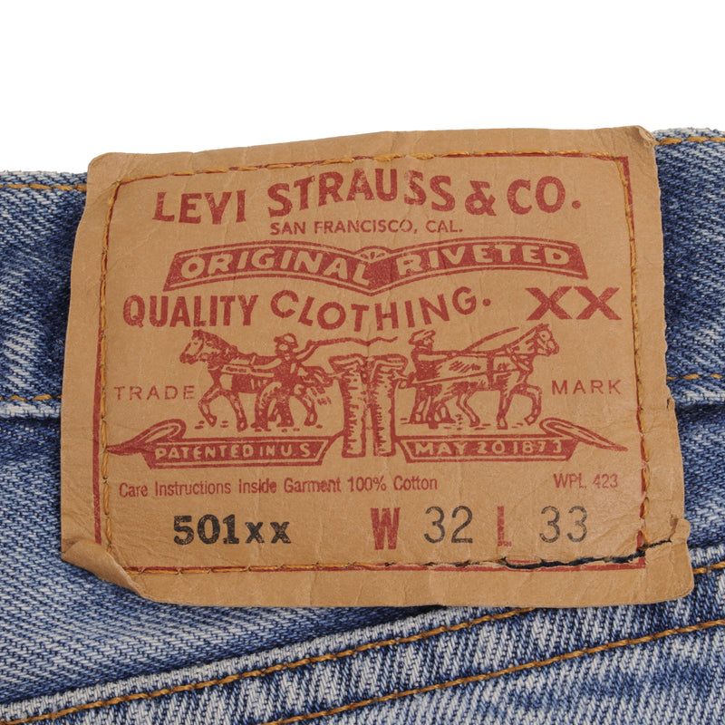 Vintage Levis 501 Indigo Jeans With Light Wash and Beautiful Whiskers 1990S Size 31X30 Made In Usa Size on Tag 32X33 Actual Size 31X30 Back button #552