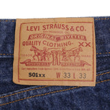 Beautiful Indigo Levis 501 Jeans 1990S Made in USA with very dark wash  Size on Tag 33X33 Actual Size 33X31 Back Button #524