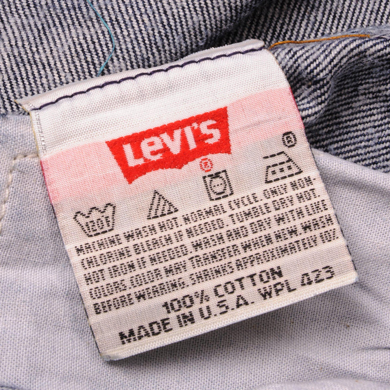 Beautiful Indigo Levis 501 Jeans 1990s Made in USA with a very dark wash.  Size on Tag 40X34  ACTUAL SIZE 38X31  Back Button #u53