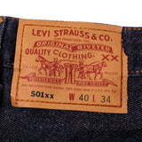 Beautiful Indigo Levis 501 Jeans 1990s Made in USA with a very dark wash.  Size on Tag 40X34  ACTUAL SIZE 38X33  Back Button #552