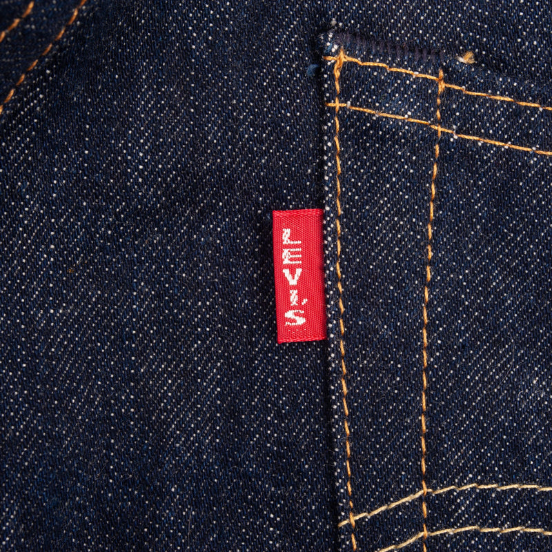 Beautiful Indigo LVC Levis Big E 501XX Jeans With Single Stitch, Hidden Rivet and Selvedge Made in USA with Dark Blue Wash. 2000s

Size 32X34 (same actual Size)

Back Button: #4420