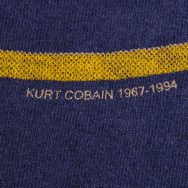 Vintage Blue All Over Print Nirvana Kurt Cobain 1967-1994 Screen Stars Best Tee Shirt Size Large Made In USA With Single Stitch Sleeves.