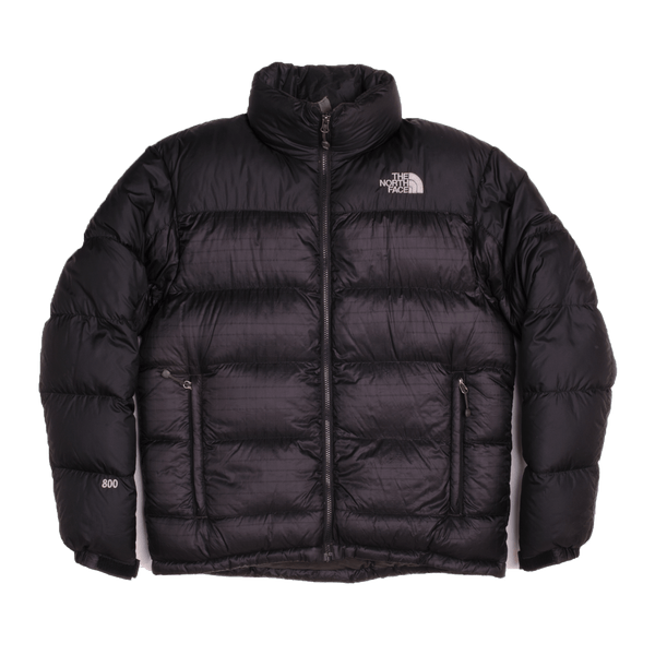 The moment you see the oversized baffles you know you're looking at the iconic Nuptse Jacket. This durable piece has lofty 800-fill down and a sleek.