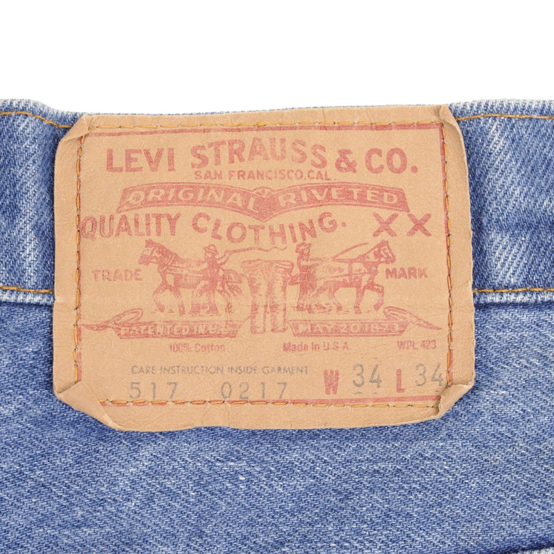 Beautiful Indigo Levis 517 Jeans With Blue Bar Tacks 1980s Made in USA with Medium Dark Wash With Light Whiskers.   Size on tag 34X34 Actual Size 33X34 Back Button #650