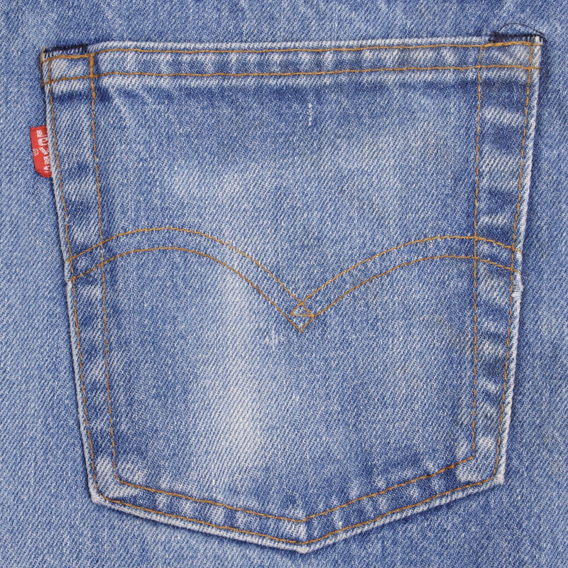 Beautiful Indigo Levis 517 Jeans With Blue Bar Tacks 1980s Made in USA with Medium Dark Wash With Light Whiskers.   Size on tag 34X34 Actual Size 33X34 Back Button #650