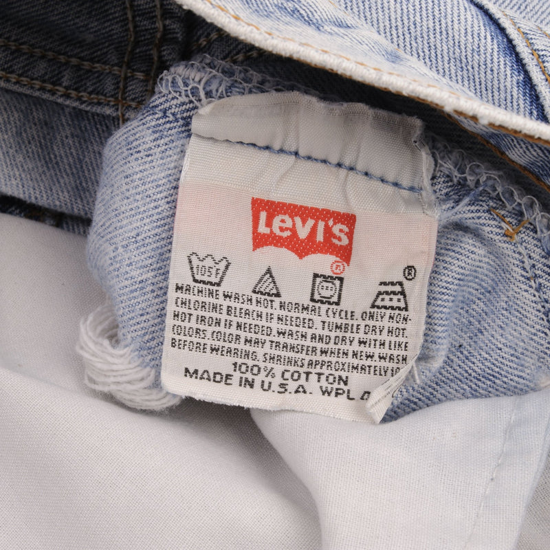 Beautiful ndigo Levis 501 Short Jeans Made in USA with a light blue wash 1990S  Size 32  Back Button #524