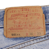 Beautiful ndigo Levis 501 Short Jeans Made in USA with a light blue wash 1990S  Size 32  Back Button #524