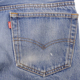 Beautiful Indigo Levis 501 jeans Made in USA with Light Wash.  Size on tag 35X23 Actual Size 33X28 Back Button #501