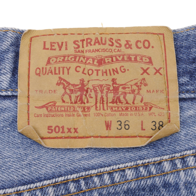 Beautiful Indigo Levis 501 jeans 1980s Made in USA with Medium Light Wash.  Size on tag 36X38 Actual Size 35X34  Back Button #552