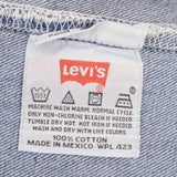 Beautiful Indigo Levis 501 Woman Jeans 1993 with Medium Wash Preshrunk Deadstock  Size on tag 30X34 Actual Size 30X33  Back Button #190