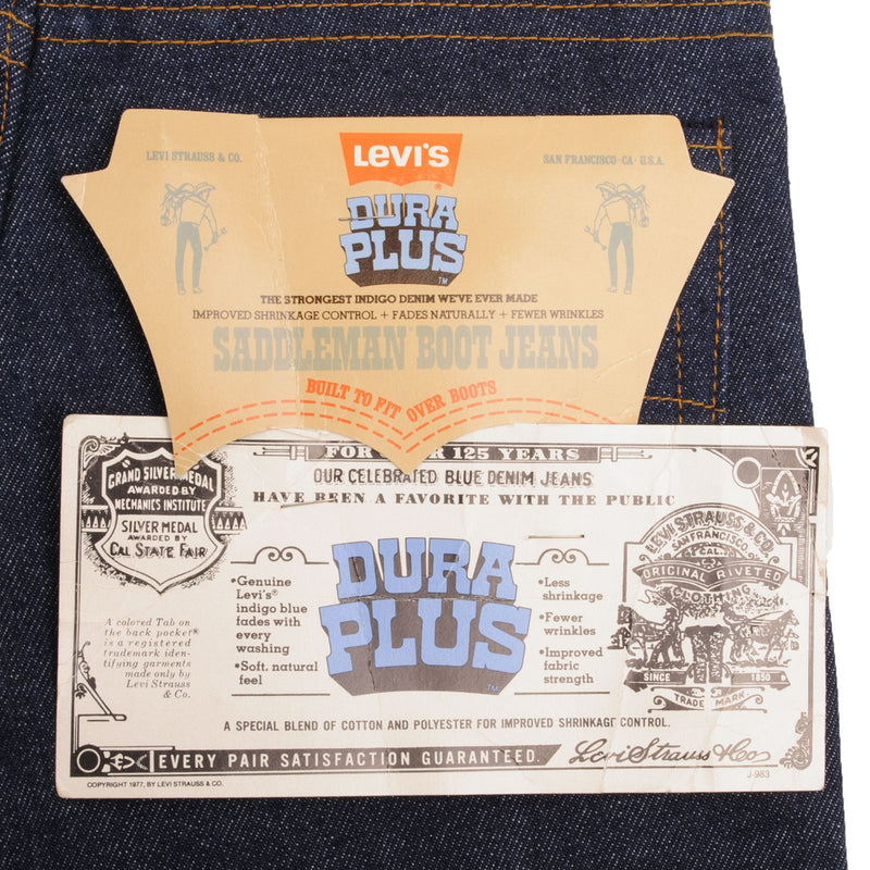 Vintage Levis 717 Saddleman Boot Cut Dura Plus Jeans 1977 Size 26X34 Made In Usa Deadstock With a Very Dark Wash  Size On Tag 26X34  Back Button #553  Talon 42 Zipper