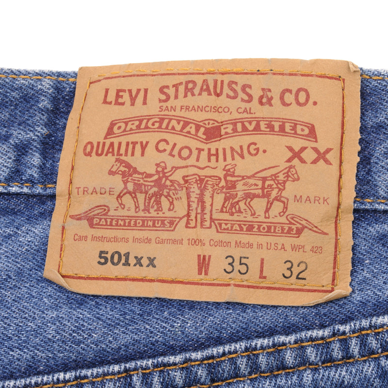 Beautiful Indigo Levis 501 Jeans 1990s Made in USA with Medium Dark Wash  Size on tag 35X32 Actual Size 34X29 Back Button #552