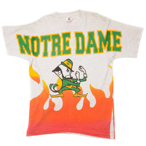 Vintage All Over Print University Of Notre Dame On Fire Tee Shirt 90s Size Large Made In USA With Single Stitch Sleeves.