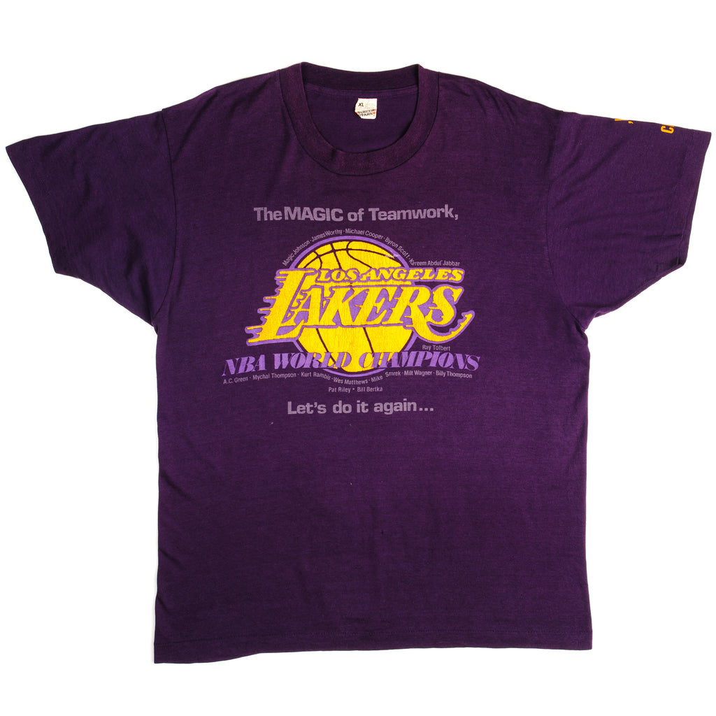 80s LA Lakers vintage NBA single stitch T-shirt. Tagged as a large,  measures medium